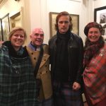 3 scottish tourist guides in New York hotel corridor with Sam Heughan